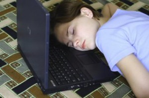 Sleeping child on computer